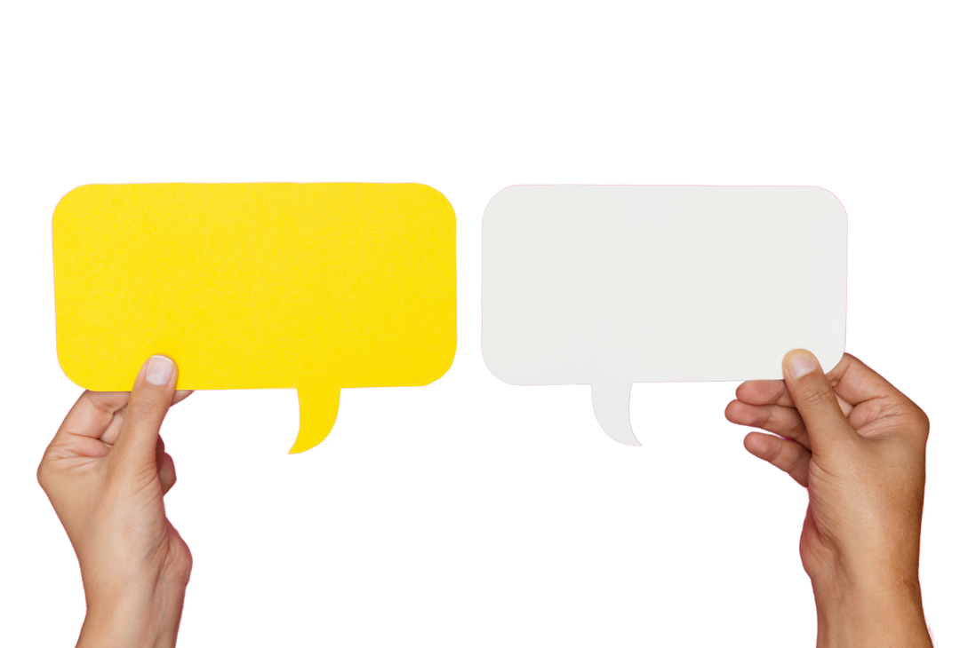Two hands holding up speech bubble cut outs