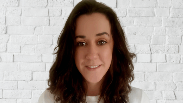 Headshot of Hazel Comerford, EPIC's SEA Advocacy Officer. She has medium length curly brown hair. She is wearing a white t-shirt.